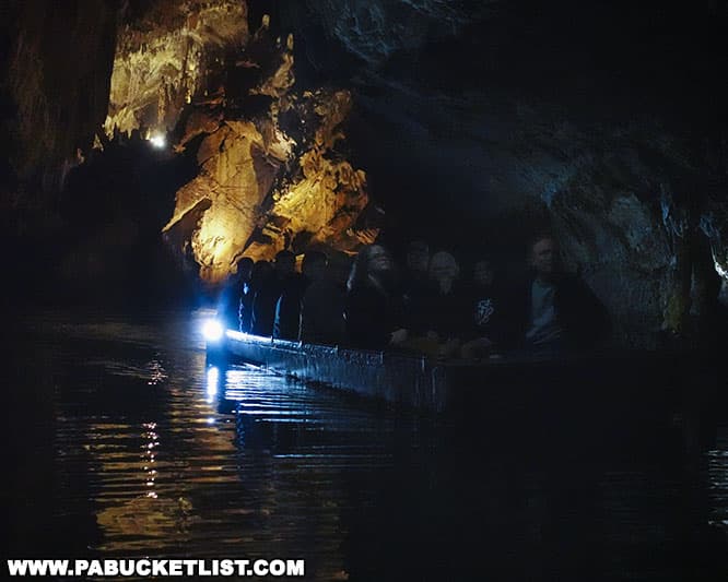 A tour boat making its way through Penn's Cave.
