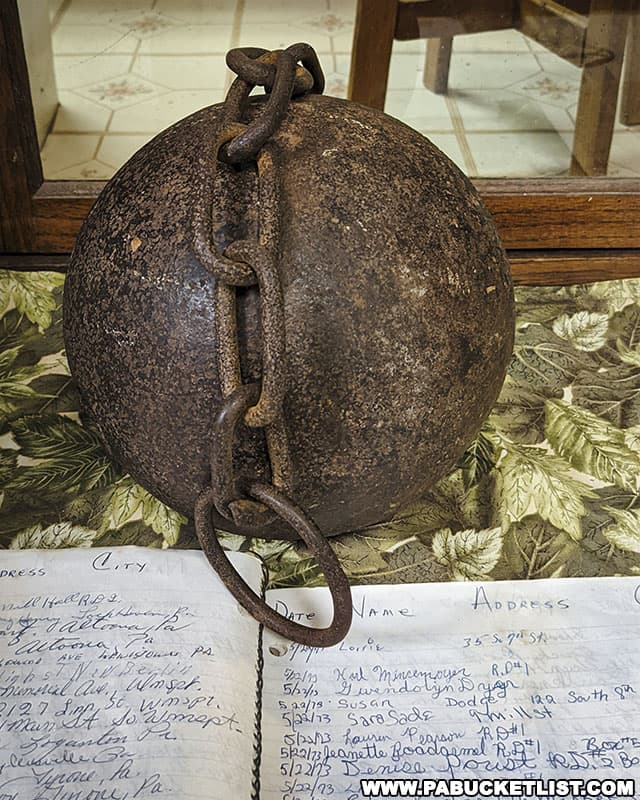 A ball and chain that was used when robbers were imprisoned in the cave by local settlers.