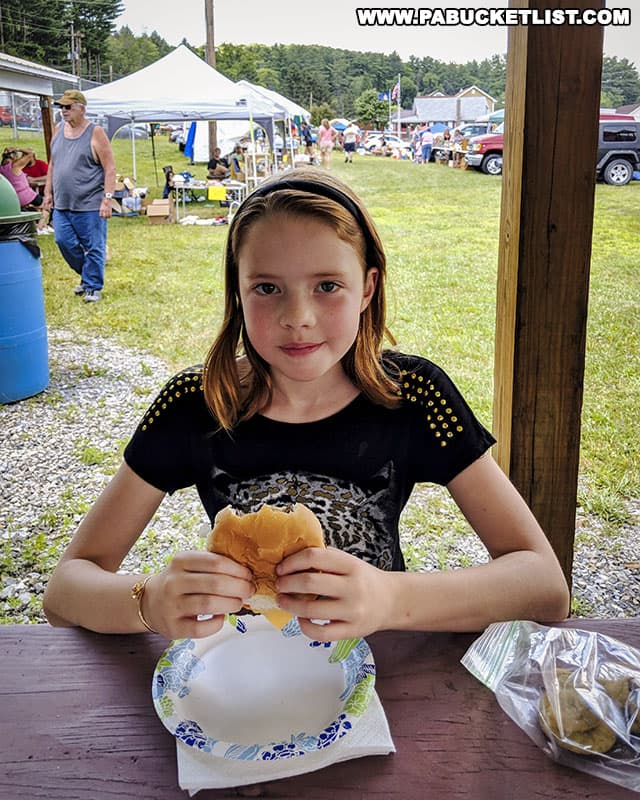 Lunch break at a food stand in Karthus during the 100 Mile Yard Sale.