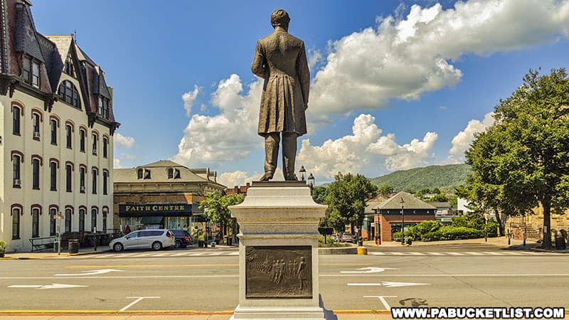 Statue of Andrew Curtin looking out over the Diamond in Bellefonte Pennsylvania.