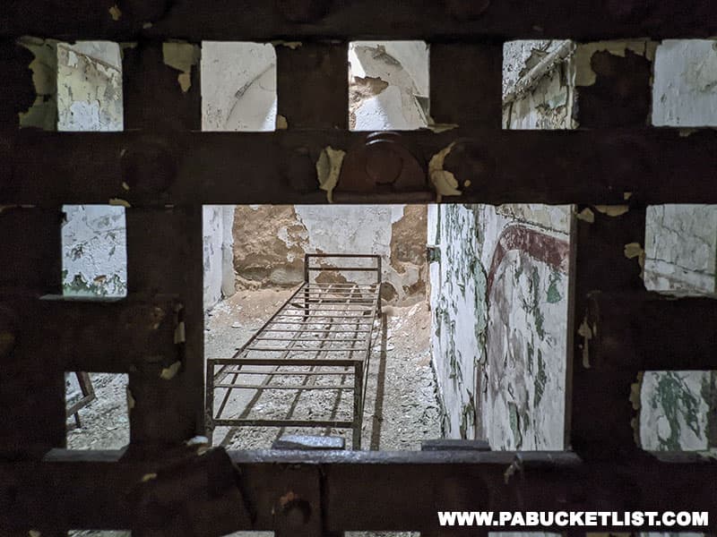 Cells at Eastern State Penitentiary were constructed to allow prisoners to enter and exit their cells through metal doors that were covered by a heavy wooden door to filter out noise.