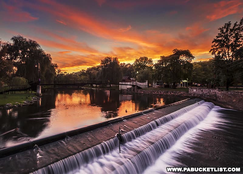 Sunset over the Falls on Spring Creek at Talleyrand Park in Bellefonte Pennsylvania.