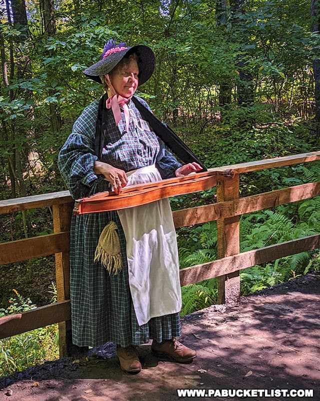 A dulcimer player entertaining guests at Mountain Craft Days in Somerset Pennsylvania.