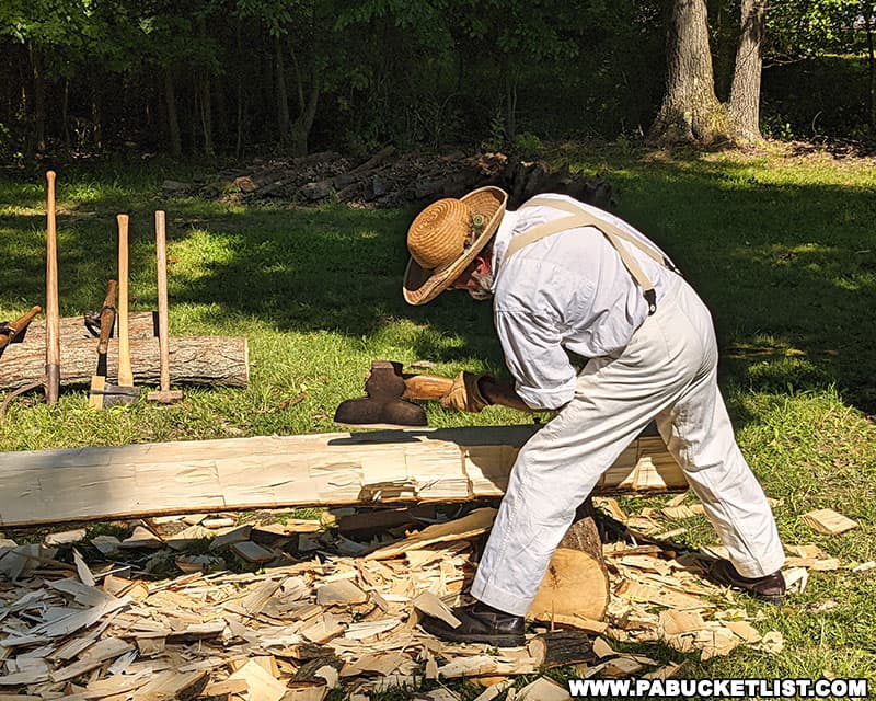 A demonstration of how hand-hewn logs are made at Mountain Craft Days in Somerset Pennsylvania.