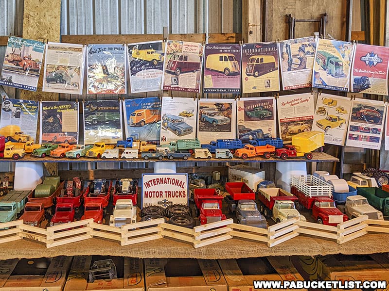 Vintage farm trucks display in side the Toy Building at the Nittany Antique Machinery Show in Centre Hall PA.