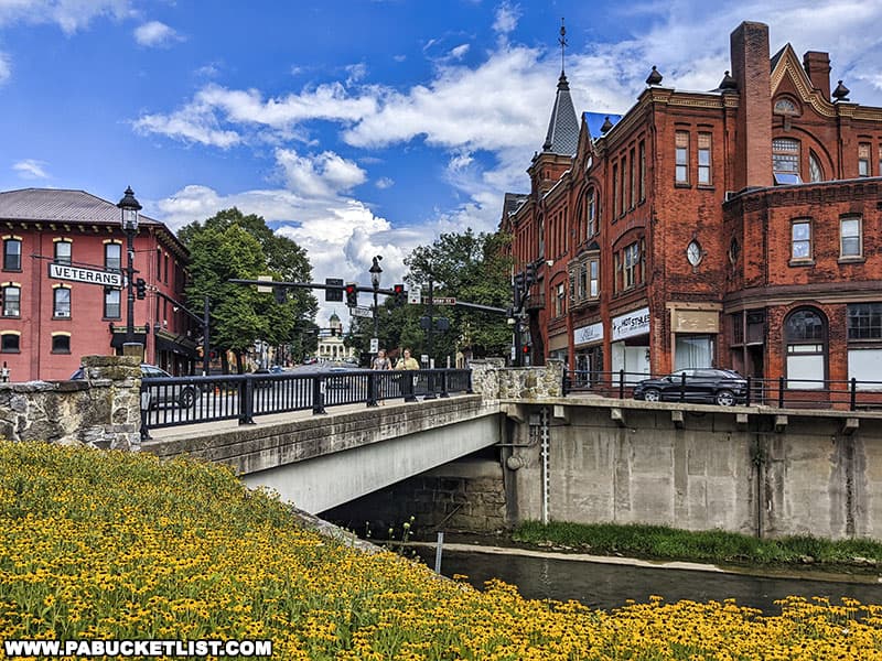 A view of Veterans Bridge and the buildings along High Street from Talleyrand Park in Bellefonte PA.