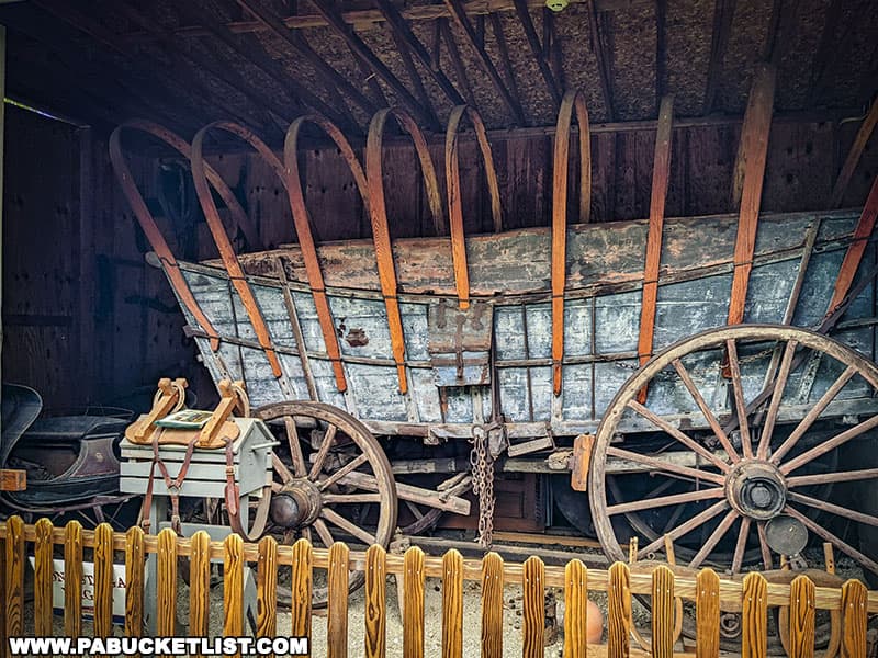 A wagon shed that houses an authentic late 18th century Conestoga wagon at historic Hannastown in Westmoreland County Pennsylvania.
