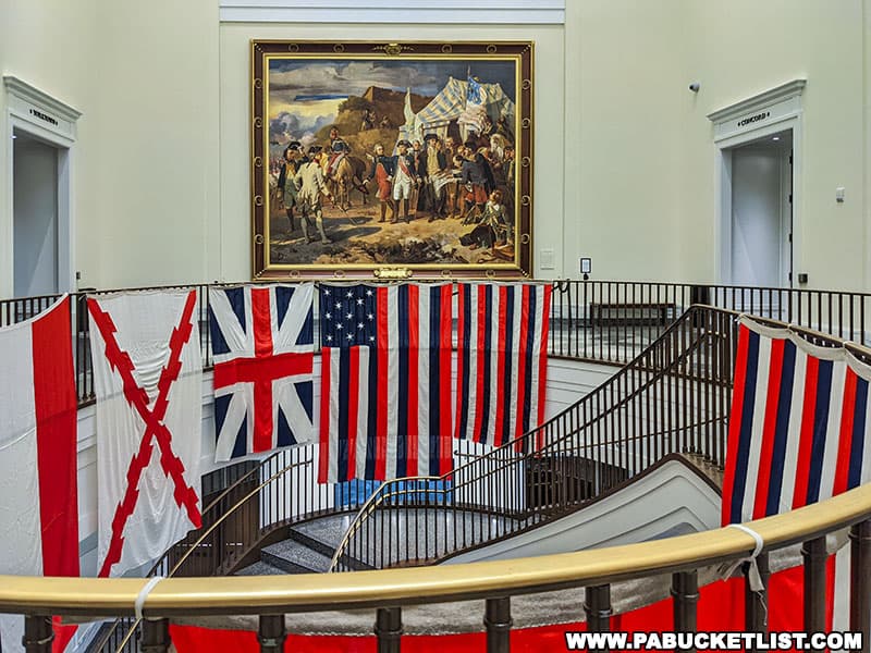 Paintings and flags in the rotunda of the Museum of the American Revolution in Philadelphia Pennsylvania.