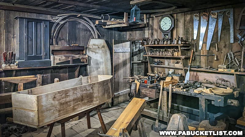 A large recreation of a woodworking shop at the Taber Museum contains the hand tools of a 19th century artisan, skilled in the shaping and building of wooden objects.