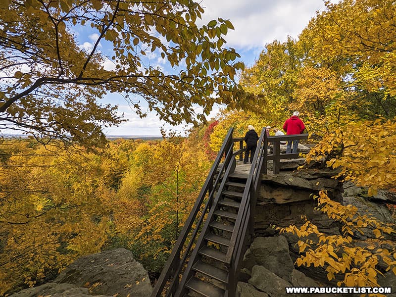 The scenic overlook platform at Beartown Rocks in the Clear Creek State Forest is perched atop a gigantic rock formation.