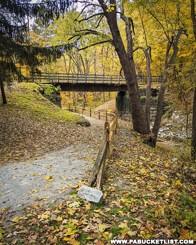 The Cedar Creek Gorge Trailhead at Cedar Creek Park is easily identified by the split-rail fence along the trail.