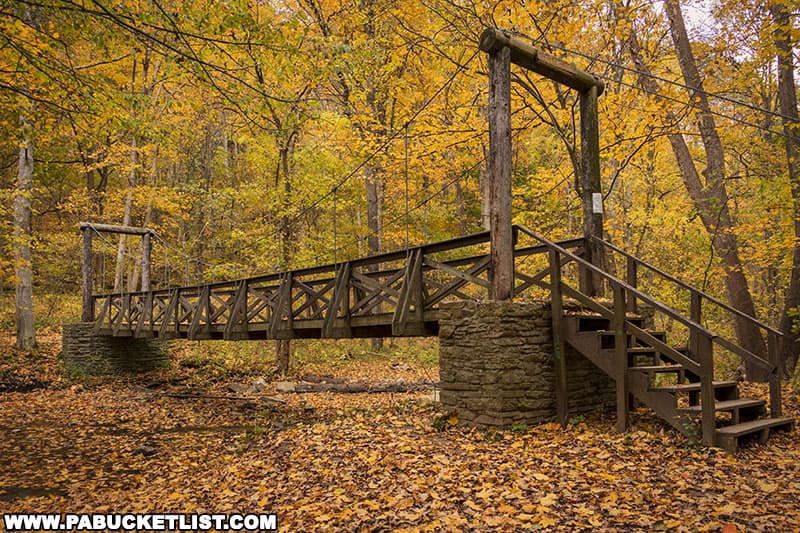 The lower (closest to the trailhead) suspension bridge along the Cedar Creek Gorge Trail in Westmoreland County Pennsylvania.