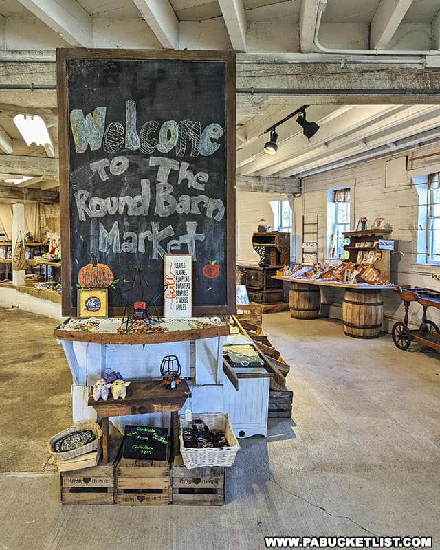 The Round Barn market sells a variety of items including fruits, vegetables, and baked goods.