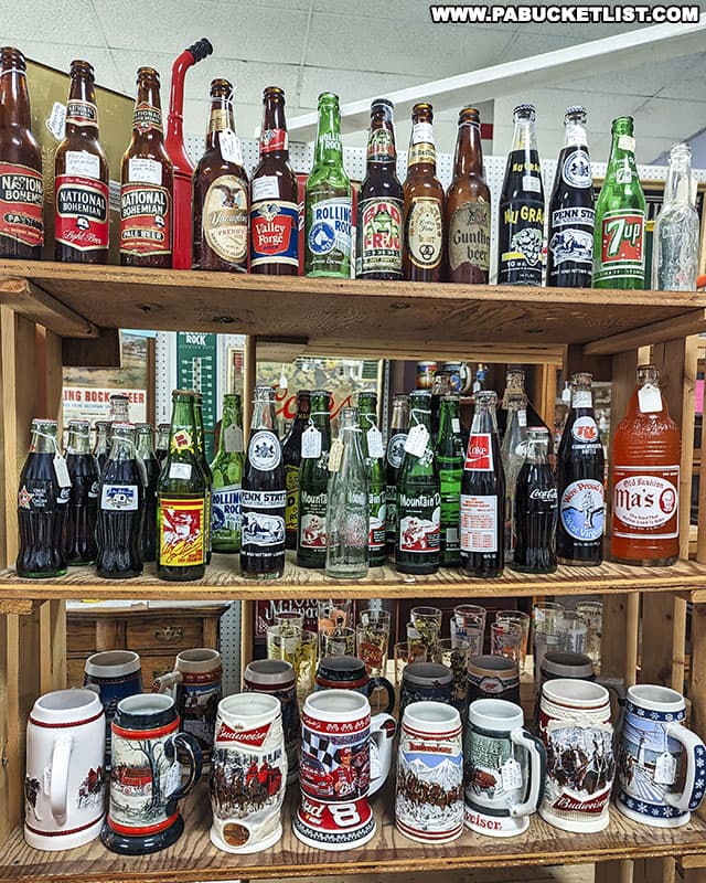 Vintage beer steins and bottles at Black Rose Antiques and Collectibles in the Chambersburg Mall.