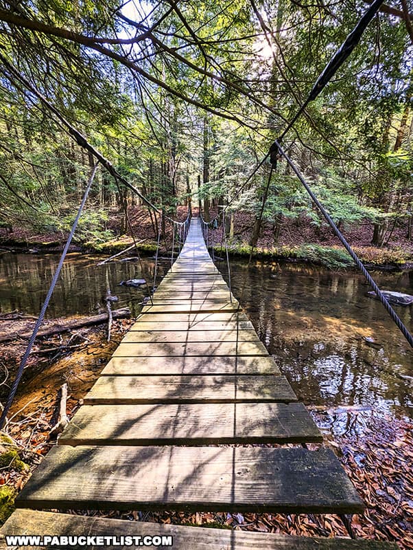 The Clear Shade Creek swinging bridge does indeed swing and sway as you cross it.