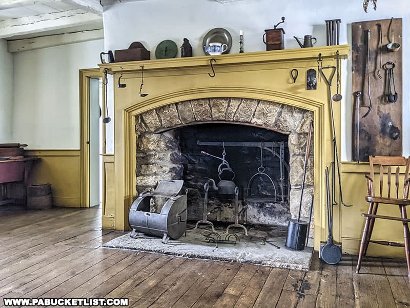 The fireplace inside the winter kitchen provided a place to cook and helped heat the Compass Inn.