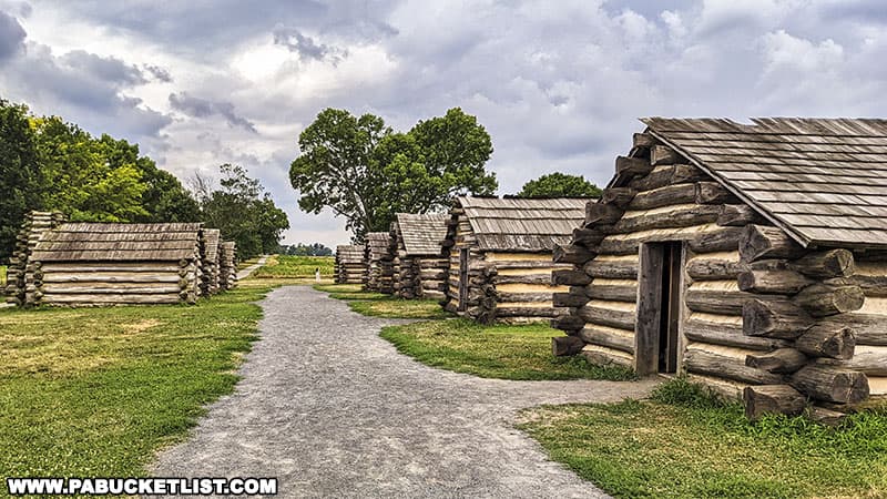 A row of replica soldiers huts at Valley Forge National Historic Park.