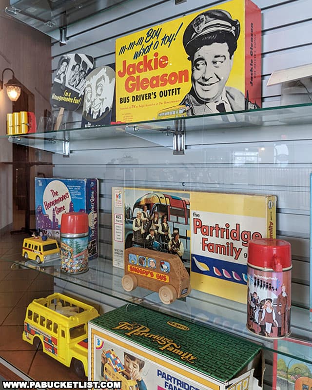 Transportation-themed games and Halloween costumes on display at the AACA Museum.