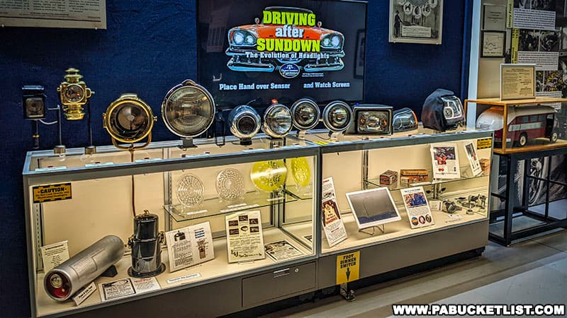 An exhibit highlighting the evolution of automotive headlights at the AACA Museum in Hershey Pennsylvania.