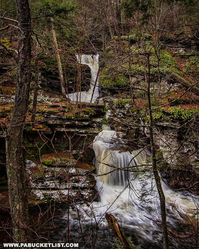 A view of Adams Falls at Ricketts Glen State Park from the neighboring hillside showing parts of all three tiers.