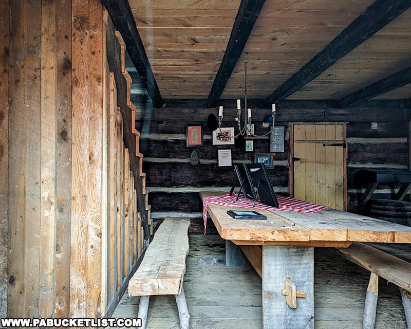 Interior of the Bloody Knox Cabin in Clearfield County PA as viewed through a window.