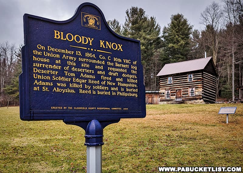 Bloody Knox historical marker along Route 453 in front of the cabin.