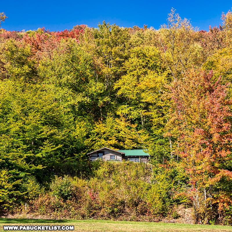 The Webber cabin sits on a hillside behind the exhibit hall at the Pennsylvania Lumber Museum in Potter County PA.