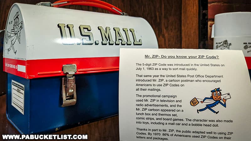 An exhibit featuring Mister Zip, who was created by the United States Postal Service in 1963 as a way to encourage people to use zip codes on their mailings.