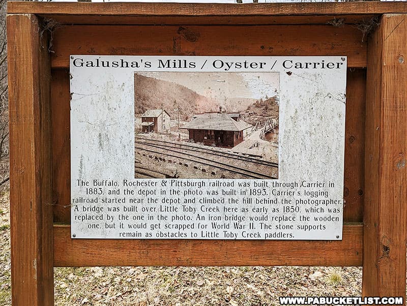 A sign along the Clarion-Little Toby Rail Trail denoting the location of the ghosts town of Carrier.
