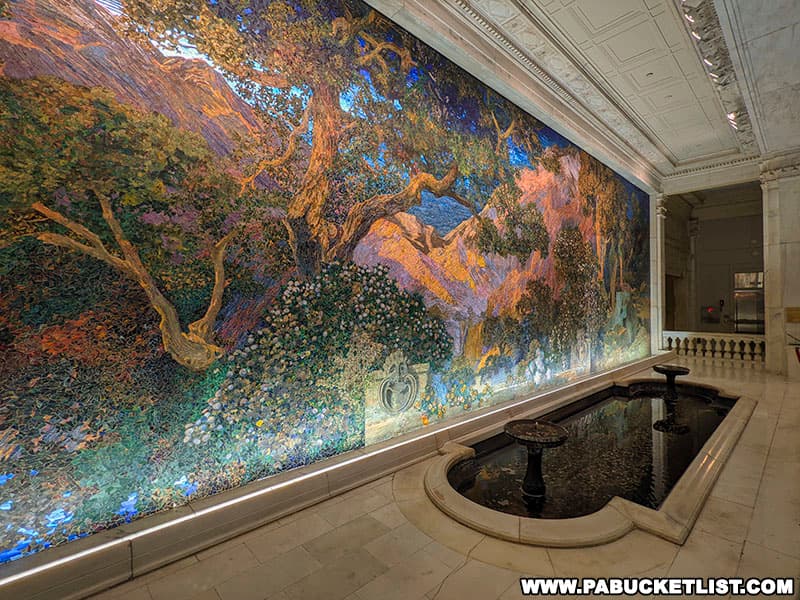 The Dream Garden was designed by Louis C. Tiffany and based on a Maxfield Parrish landscape painting.