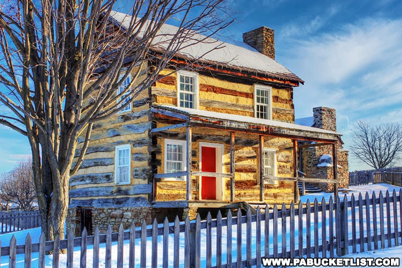 A winter view of the Adam Miller farmstead at the Somerset Historical Center in Somerset Pennsylvania.
