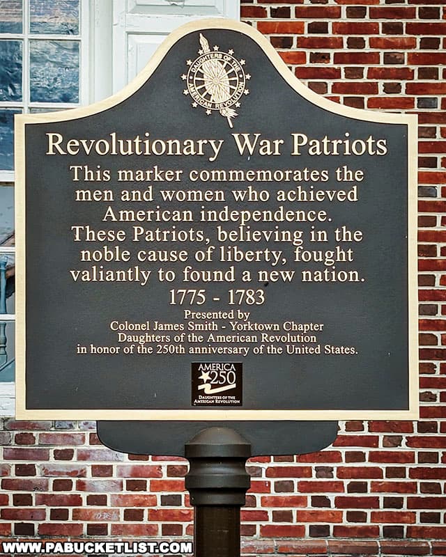 A plaque honoring the Revolutionary War Patriots in front of the Colonial Courthouse in York PA.