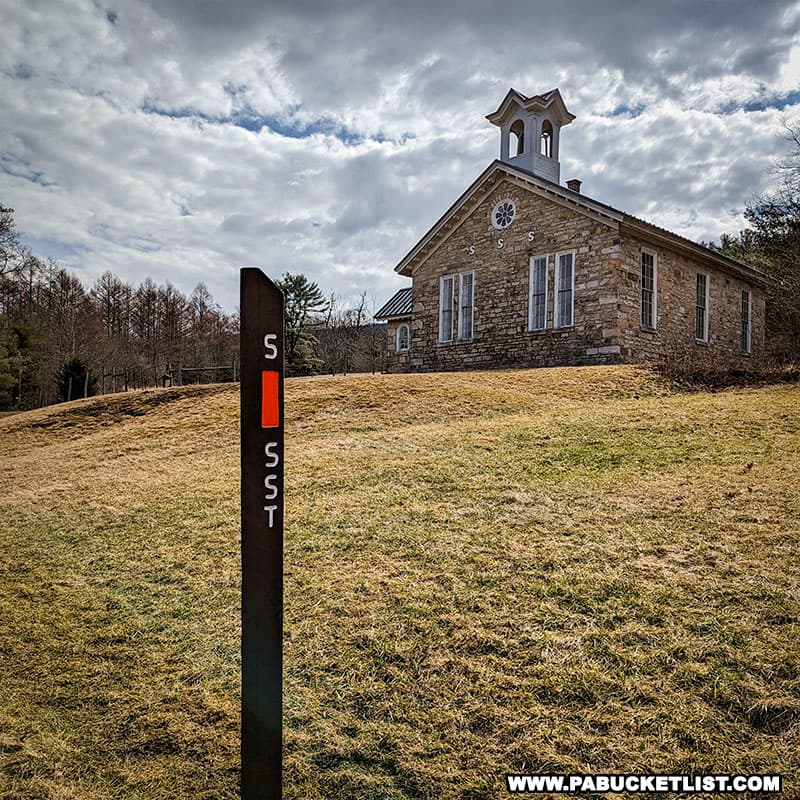 The Standing Stone Trail passes in front of the Greenwood Furnace Church.
