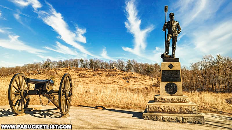 The monument to the 4th New York Independent Battery near Devil's Den, with Little Round Top in the background.