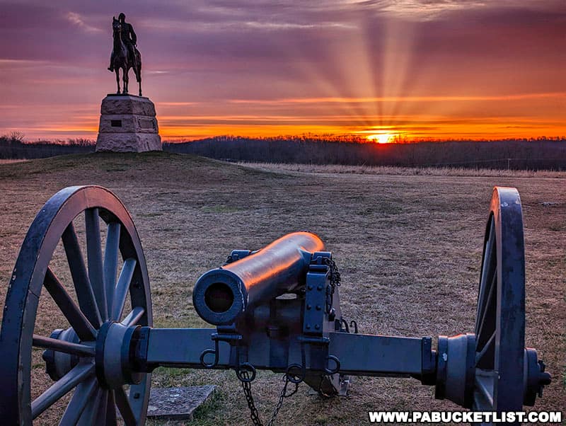 Sunrise over the Gettysburg battlefield with General Meade's monument in the background.