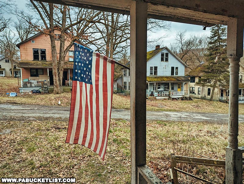 An American flag on one of the front porches at Yellow Dog Village.