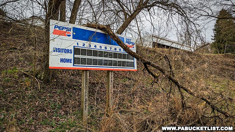 The scoreboard at the now-abandoned baseball field at Yellow Dog Village.