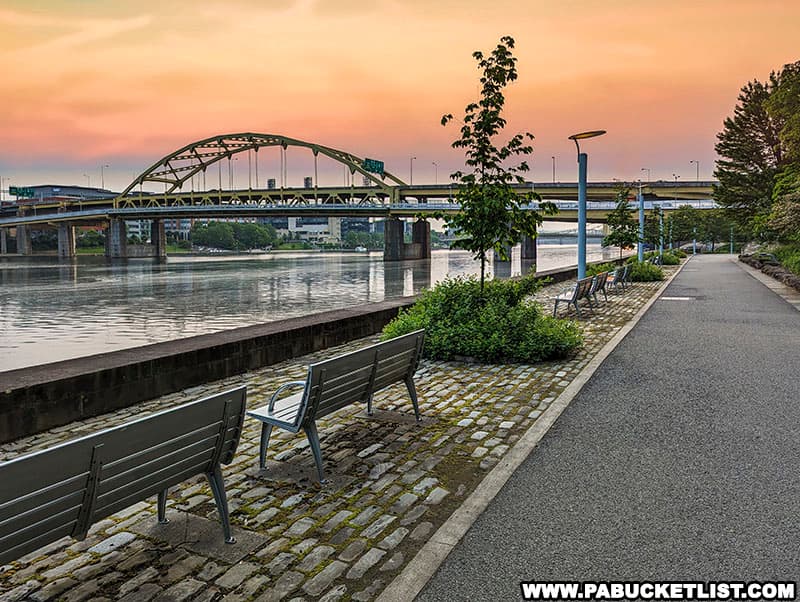 Sunrise over the Three Rivers Heritage Trail at Point State Park in Pittsburgh Pennsylvania.