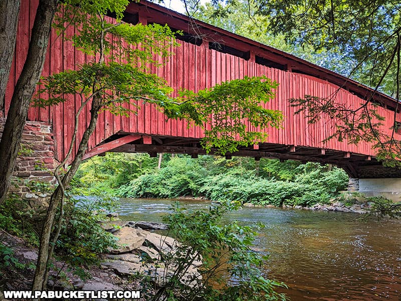 The Josiah Hess Covered Bridge is 110 feet long and spans Huntingdon Creek in Columbia County Pennsylvania.