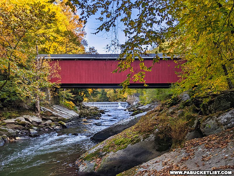 Fall foliage around McConnell's Mill Covered Bridge in Lawrence County Pennsylvania.