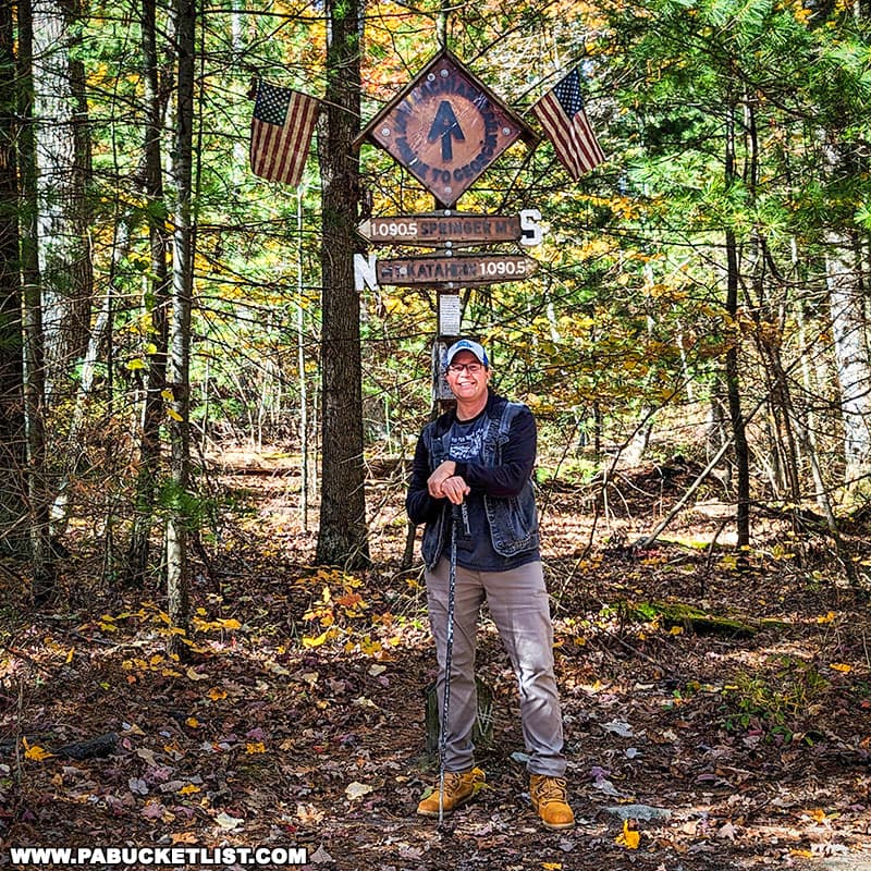 The author at the Appalachian Trail Halfway Point marker in the Michaux State Forest.