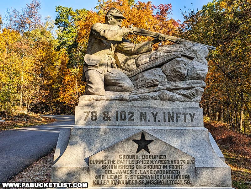 78th and 102nd New York Infantry Monument surrounded by fall foliage on Culp's Hill at Gettysburg.