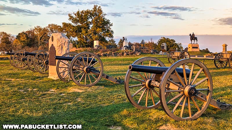 The setting sun illuminates the battlefield at the Gettysburg National Military Park in Gettysburg Pennsylvania.