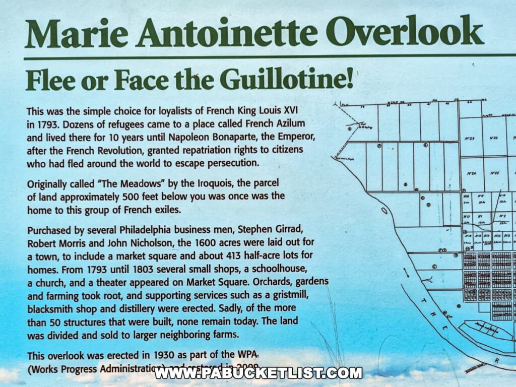 Informational display at the Marie Antoinette Scenic Overlook in Bradford County, Pennsylvania, detailing the history of the area. It describes the choice French loyalists had to make during the revolution, the establishment of French Azilum, and the purchase and development of the land by Philadelphia businessmen. A historical layout map of the original town plan is included on the right side of the panel, showing the division into lots. The text mentions the various buildings and services that once existed, such as shops, a church, and a theater, and notes that none of these structures remain today.