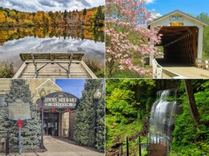 This is a collage of four images featuring notable attractions in Indiana County, Pennsylvania: Top left: A serene lake surrounded by trees with autumn foliage, reflecting the colors on the water surface, with an old wooden dock extending into the lake. Top right: Thomas Covered Bridge, a white wooden covered bridge with a sign indicating its height clearance, set against a backdrop of flowering trees in full bloom. Bottom left: The entrance to the Jimmy Stewart Museum, with a historical marker in the foreground and festive decorations around the entry, honoring the famed actor. Bottom right: A picturesque waterfall flowing through lush green woodland, with a stair pathway leading down alongside it for a closer view. The images collectively highlight the natural and cultural beauty of Indiana County.
