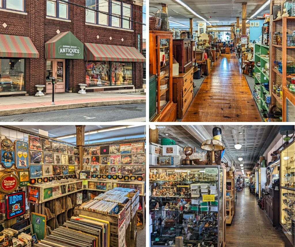 A collage of four photos showcasing different aspects of the Burning Bridge Antiques Market in Lancaster County, PA. The top left image shows the exterior of the market, a brick building with striped awnings and large display windows. The top right image captures a long aisle inside the market, lined with wooden furniture, shelves, and various antiques. The bottom left image features a section dedicated to vinyl records, with walls covered in album covers and crates filled with records, along with neon beer signs adding a retro feel. The bottom right image displays a detailed aisle filled with glass cases containing collectibles and vintage items, highlighting the market's extensive and diverse offerings from over 200 vendors.