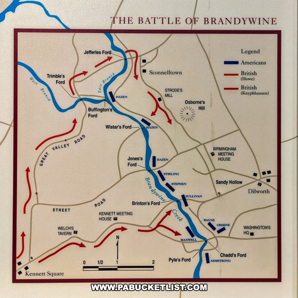 A detailed map at Brandywine Battlefield Park in Chester County, Pennsylvania, depicting the troop movements and key locations of the Battle of the Brandywine. The map shows the positions of American and British forces, marked in blue and red respectively, with various fords, roads, and strategic points such as Kennett Meeting House, Sandy Hollow, and Washington's headquarters clearly labeled. This map illustrates the largest and longest single-day land battle of the American Revolution.
