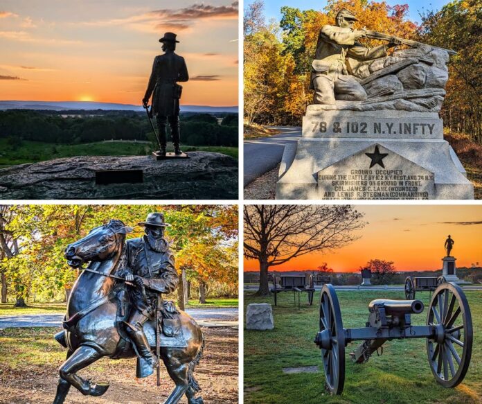 The collage features four photos taken on the battlefield at Gettysburg National Military Park. The top left image shows a statue of a Union officer on Little Round Top during a peaceful sunset, overlooking the expansive battlefield. The top right image captures a monument dedicated to the 78th and 102nd New York Infantry, depicting a soldier crouched behind rocks, set against a backdrop of colorful autumn foliage. The bottom left image displays a statue of a cavalry officer on horseback, surrounded by vibrant fall trees, highlighting the dynamic and detailed sculpture. The bottom right image features cannons and a monument at sunset, with the sky painted in warm hues and silhouettes of trees and statues in the background, creating a reflective and serene atmosphere.