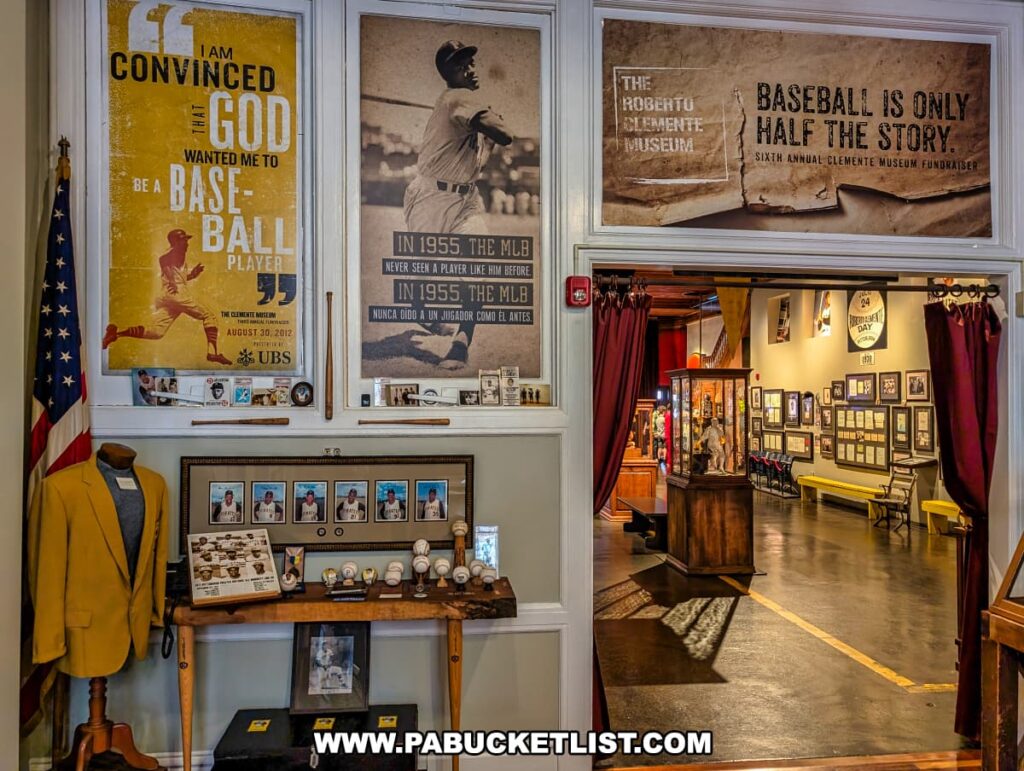 Entrance to the exhibit hall at the Roberto Clemente Museum in Pittsburgh, PA, with inspirational quotes, vintage photos, baseball memorabilia, and Clemente-themed signage on the walls, including the phrase “Baseball is only half the story,” emphasizing his legacy beyond the game.