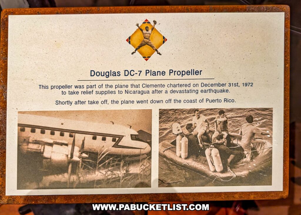 Informational display at the Roberto Clemente Museum in Pittsburgh, PA, describing the Douglas DC-7 plane crash that took Roberto Clemente’s life on December 31, 1972, while delivering earthquake relief to Nicaragua, with historic images of the aircraft and rescue efforts alongside text explaining the tragic event.